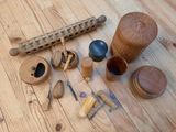 a wooden table with a lot of different items on it