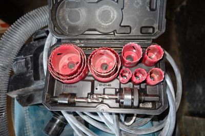 a bunch of tools in a case on a table