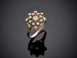 a diamond cluster ring on a black surface