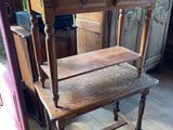 a wooden chair that is sitting on a hard wood floor
