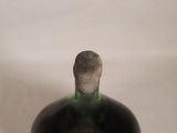 a bottle of wine that is sitting on a table