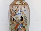 a vase that is sitting on a white table