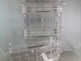 three clear acrylic display cases stacked on top of each other