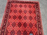someone standing on a rug with their feet on the ground