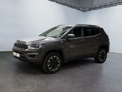 the jeep compass is parked in a large room with white walls