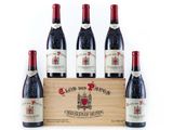 six bottles of red wine in a wooden box on a white background