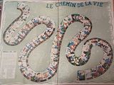 un livre sur lequel figure l'image d'un serpent et un serpent