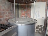 an image of a kitchen with a stove, oven, and sink