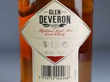 a bottle of liquor with a barcode on the label