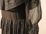 an image of a woman ' s dress on a mannequin