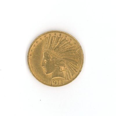 une pièce d'or sur laquelle est représentée une tête d'Indien