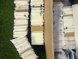 a box full of papers sitting on the grass