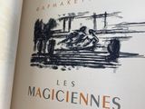 an open book with a picture of a racing car on it