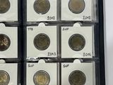 a picture of a display case with a lot of coins in it