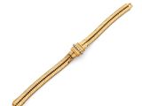 a yellow gold bracelet with a diamond clasp
