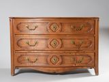 an image of a wooden chest of drawers with brass handles