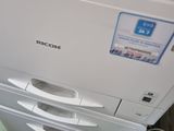 a photo of a printer sitting on top of a desk