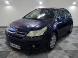 a picture of a blue citrole car parked in a garage