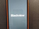 the back of an orange and black cell phone with a blackview logo on it