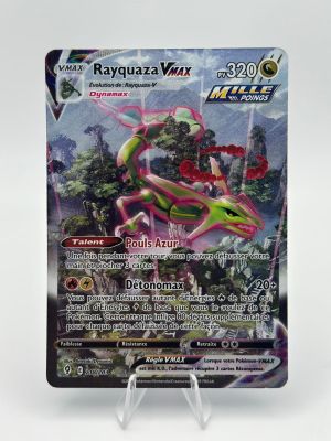 a close up of a pokemon card on a white surface