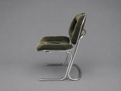 an image of a chair with a green seat on a grey background
