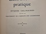the front cover of a book with a picture of a cat sitting on top of it