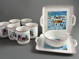 five cups and a tray with a picture of a winter scene