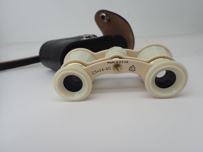 a pair of binoculars that are sitting on a table