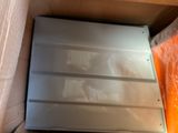 a box that has a piece of metal inside of it