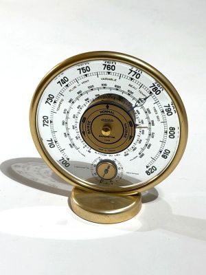a clock that is sitting on top of a table