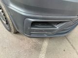 a close up of the front bumper of a car