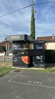 a vending machine on the side of the road
