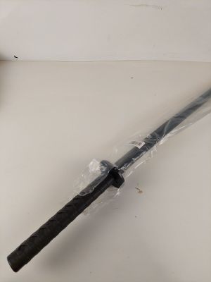 a knife that is wrapped in plastic on a table