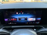 the dashboard of a car with a digital display on it