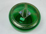 a green glass box with a diamond design on it