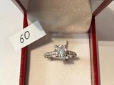 an image of a diamond ring in a red box with a price tag