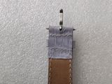 a close up of a watch strap with a clasp on it