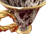 an image of a cup with a handle on it