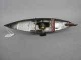 a small boat that is sitting on a table