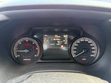 a close up of a car dashboard with a speedometer and gauges