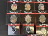 a lot of badges that are on a black table