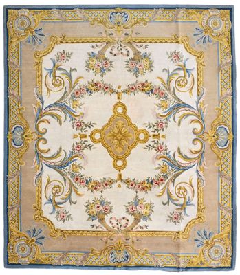 a white rug with a blue border and a gold border