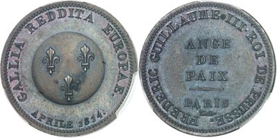 a close up of a coin on a white surface with a white background