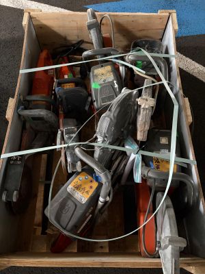 a box full of tools that are sitting on the floor