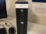 a desktop computer sitting on a desk next to a computer monitor