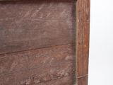 close up of a piece of wood that has been painted brown