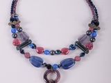 purple and blue beaded necklace with a tear shaped pendant