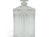 une bouteille en verre transparent munie d'un bouchon