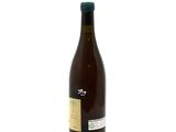 a bottle of wine that is sitting on a table