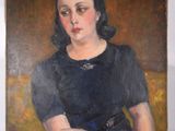 tableau représentant une femme en robe noire assise sur un canapé jaune